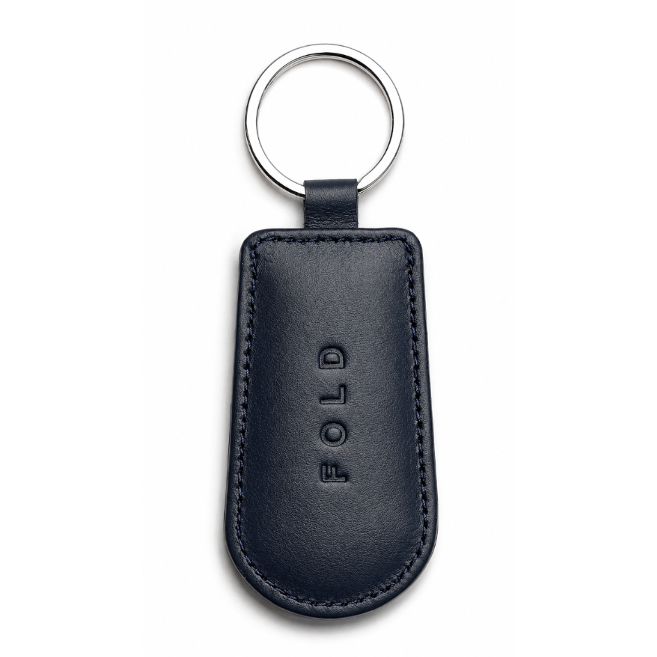 Black leather key fob with 'FOLD' branding on a white background