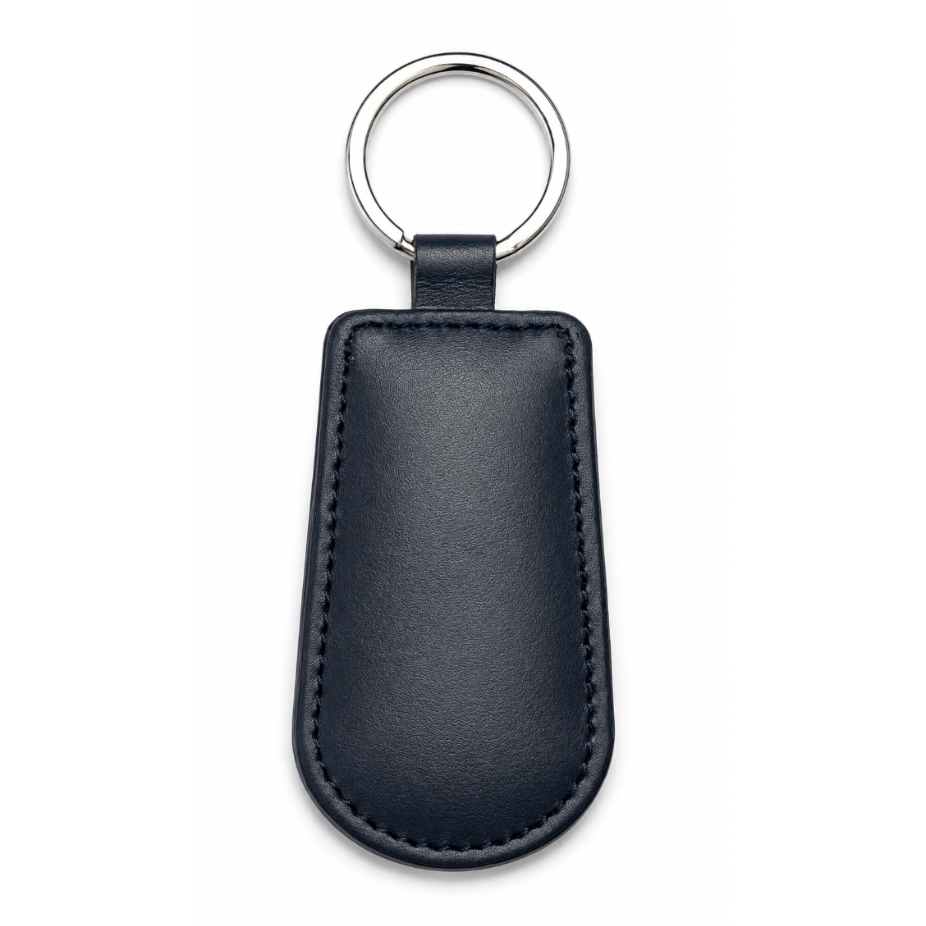 Black leather keychain with a metal ring on a white background