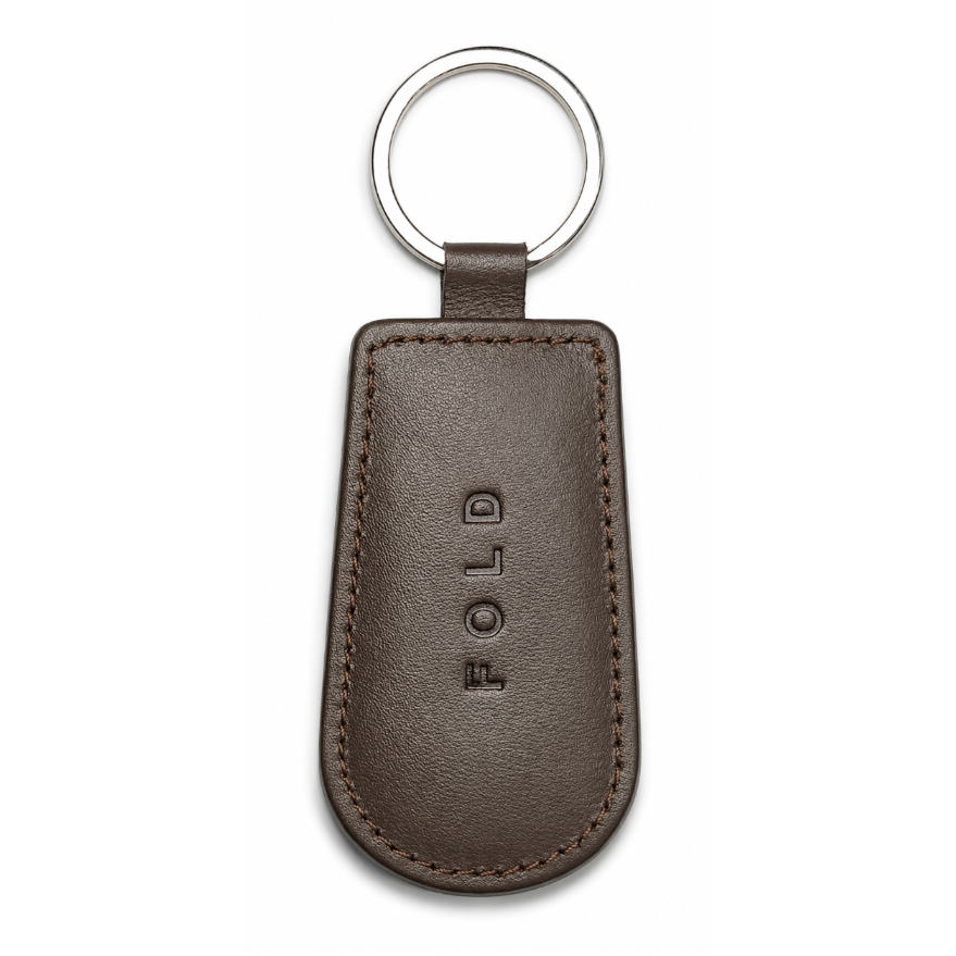Brown leather key fob with 'FOLD' branding on a white background