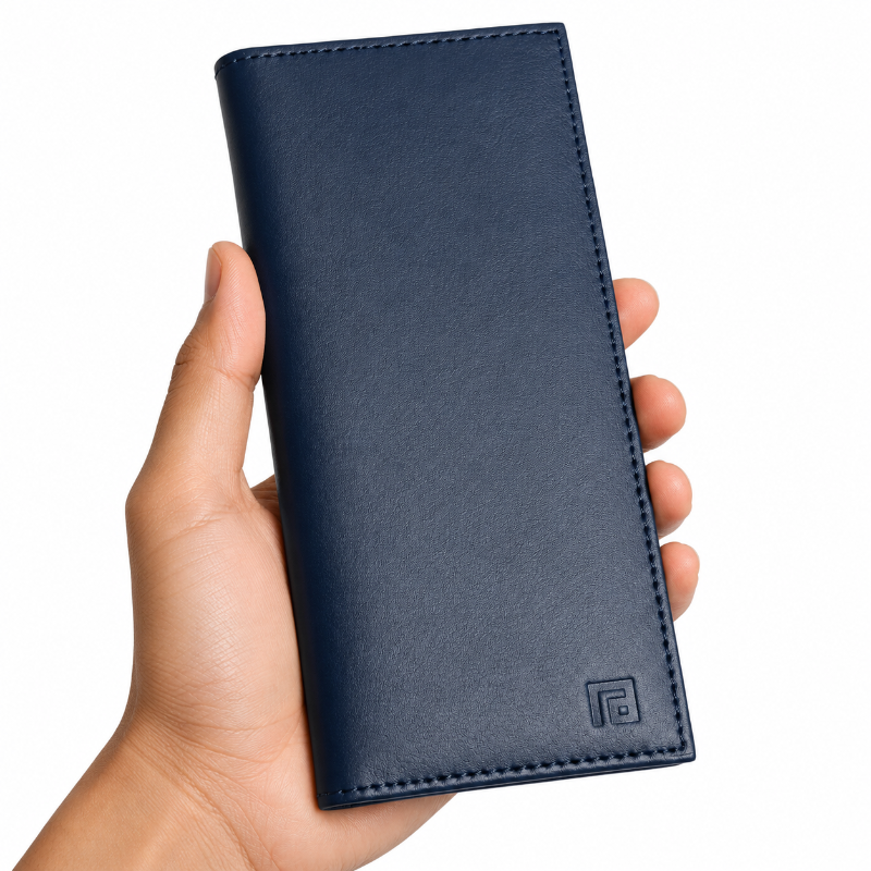 Hand holding a navy blue wallet with a visible brand logo on a white background