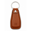 Brown leather keychain with a metal ring on a white background